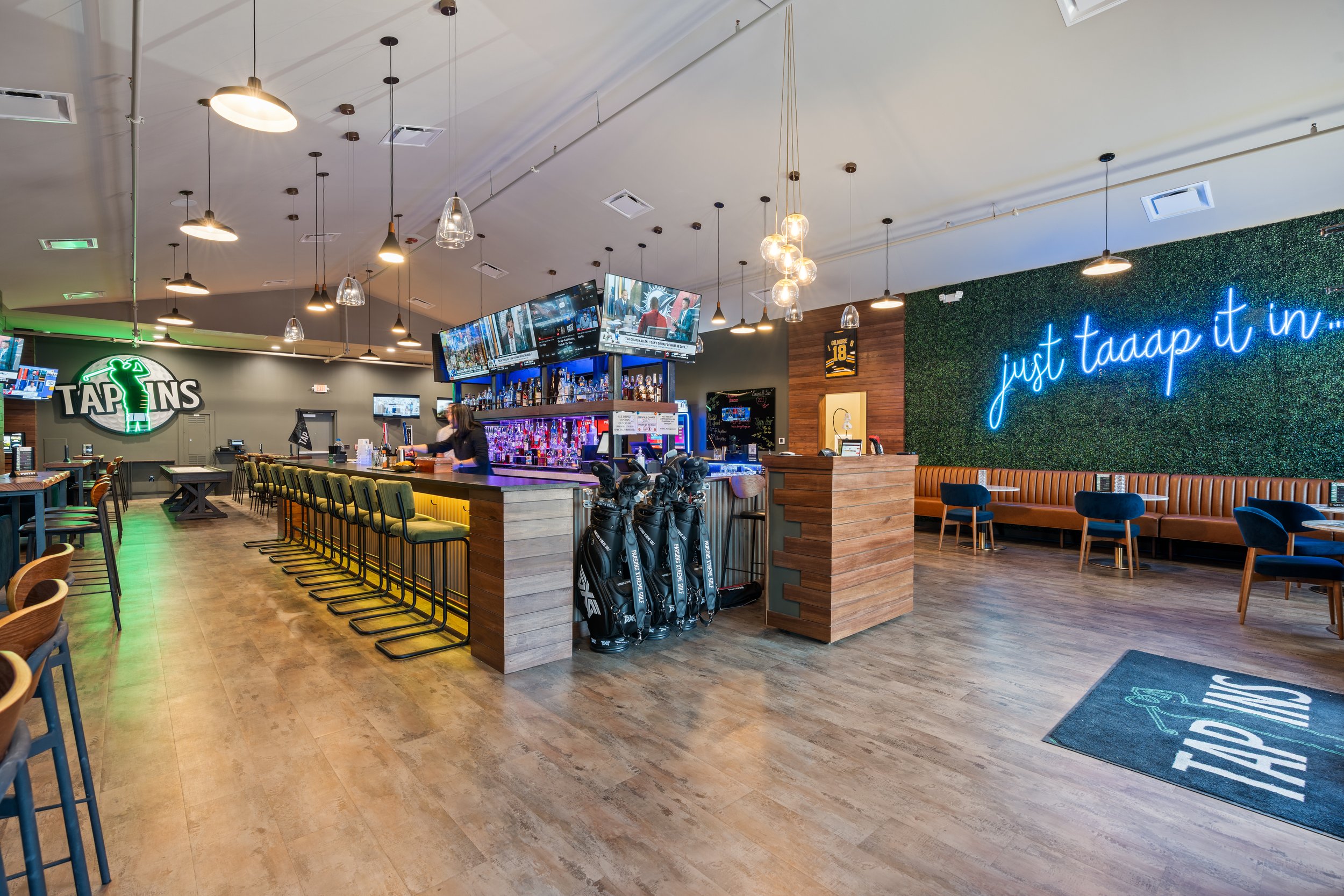 Interior at Tap Ins Tap Ins sports bars in Hoover, AL. A local hangout, entertainment hub, and event destination . project by B Group Architecture, Inc