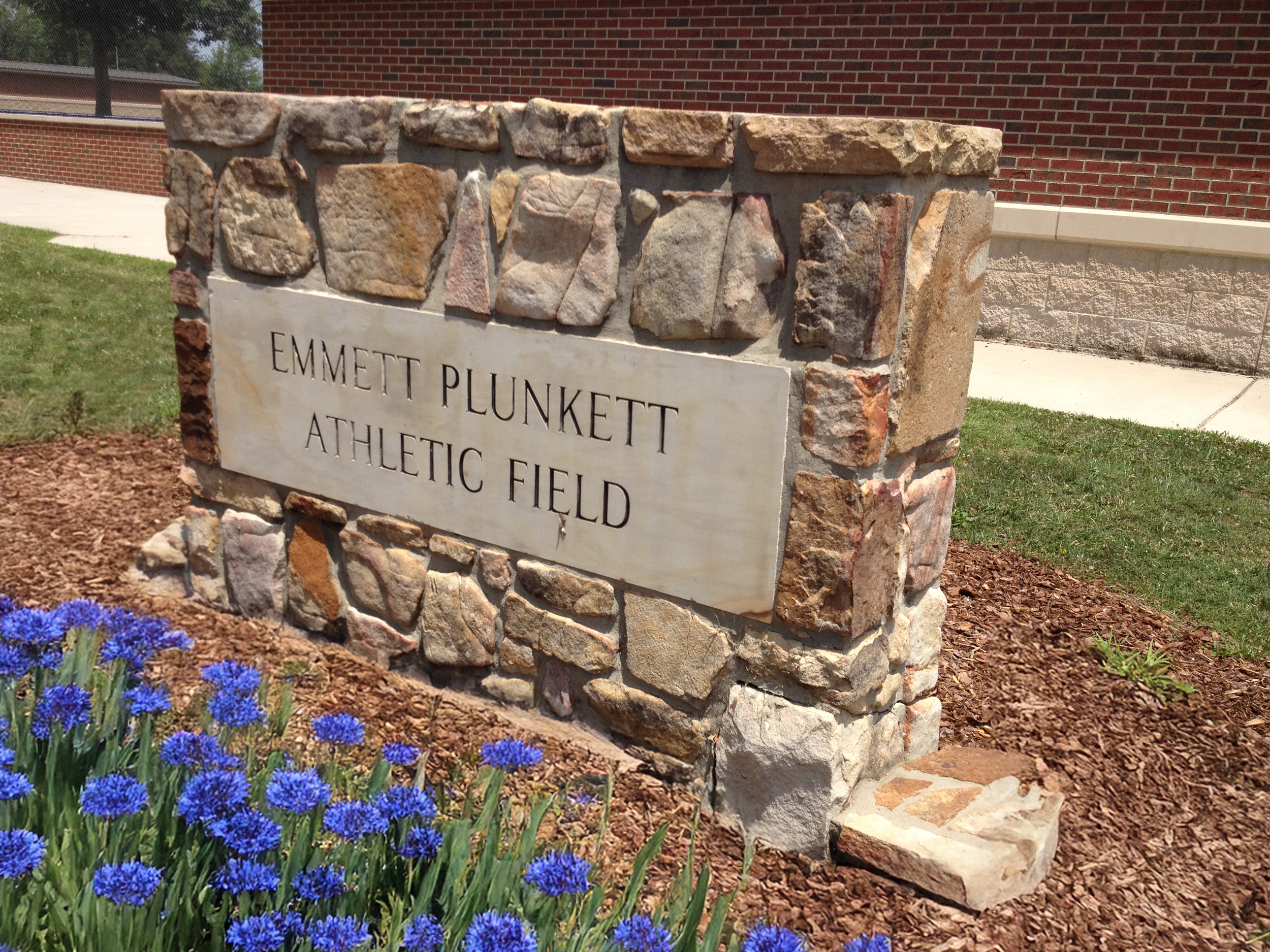 View of the Emmett Plunkett Athletic Fields sign. project by B  Group Architecture, Inc.