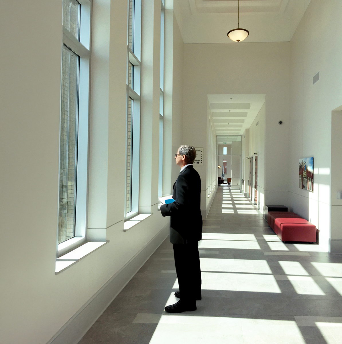 An interior view of a corridor Athens City Hall with soaring vaulted ceilings and an incredible amount of natural lights.- project by B Group Architecture, Inc.