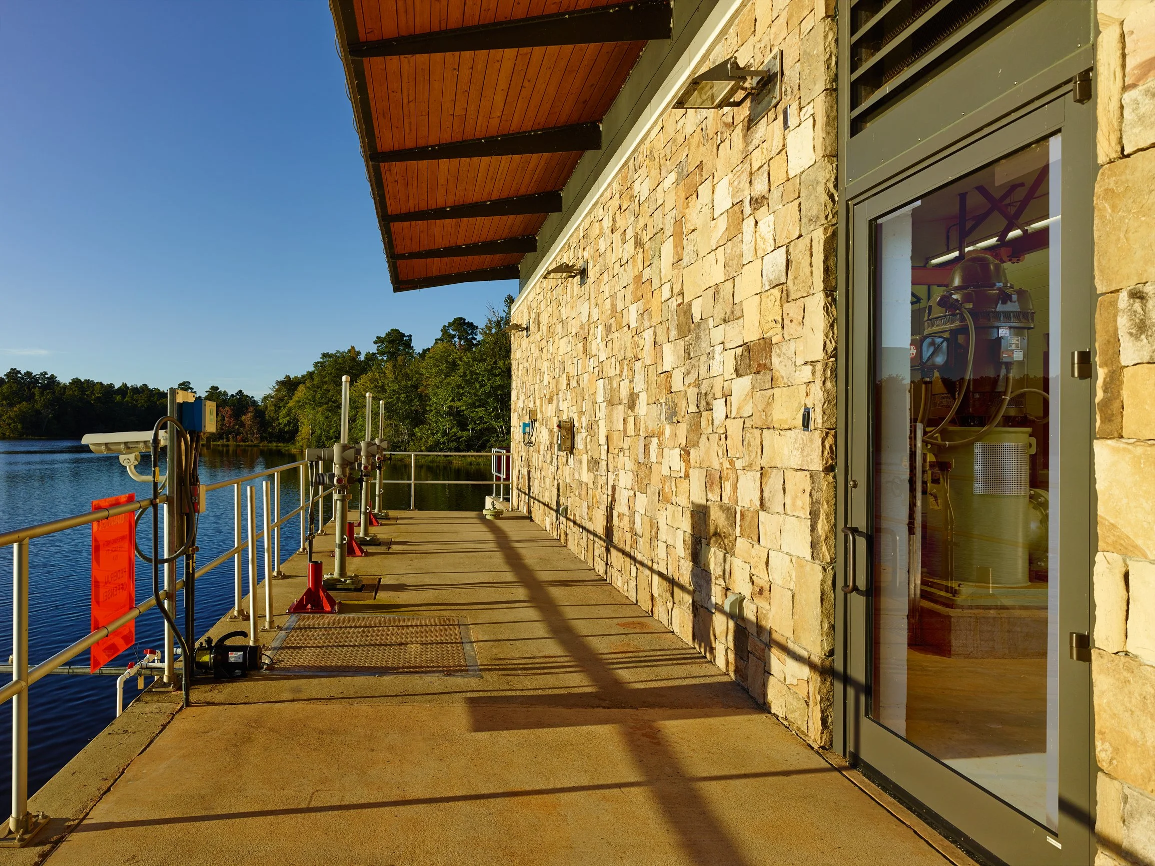 W.A Warner Williams Water treatment plant's LEED accredited modern building complex utilizing glass, steel and stone.  -project by B Group Architecture,  Inc.