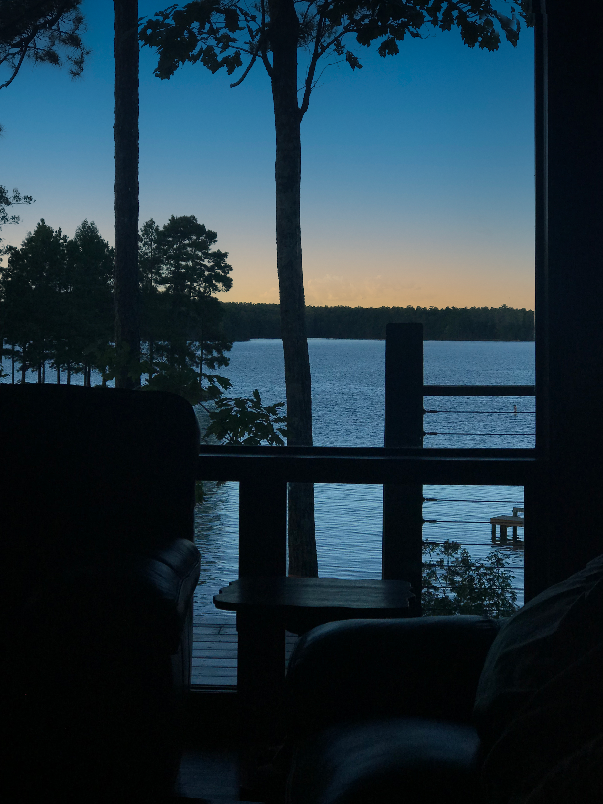 A exterior view at a lake house in Pelham, AL. taking advantage of increasing views of the natural landscape. project by B Group Architecture, Inc.