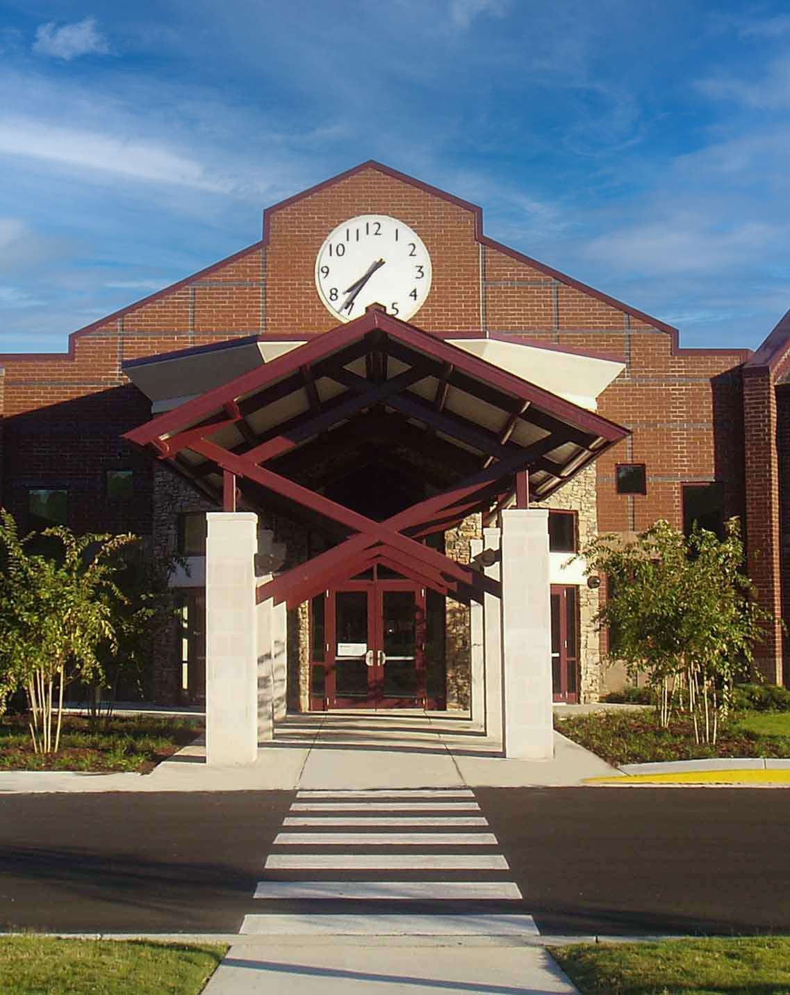 Exterior view of the clock tower and canopy entrance for the Riverchase Elementary School. project by B Group Architecture, Inc.