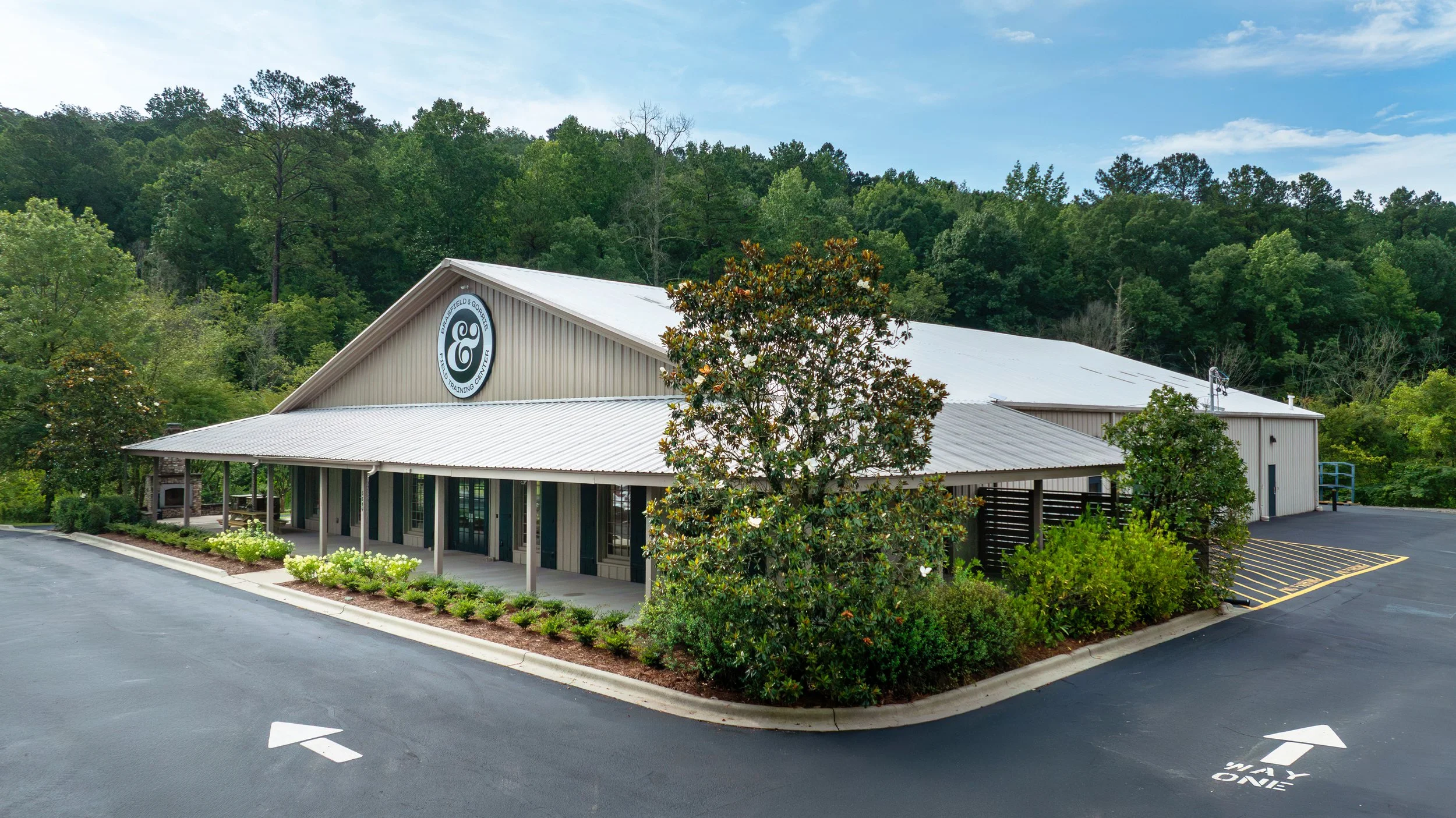 Brasfield & Gorrie Training and Development Center in Irondale, AL. Exterior view withe new paint and Ampersand signage. project by B Group Architecture, Inc.