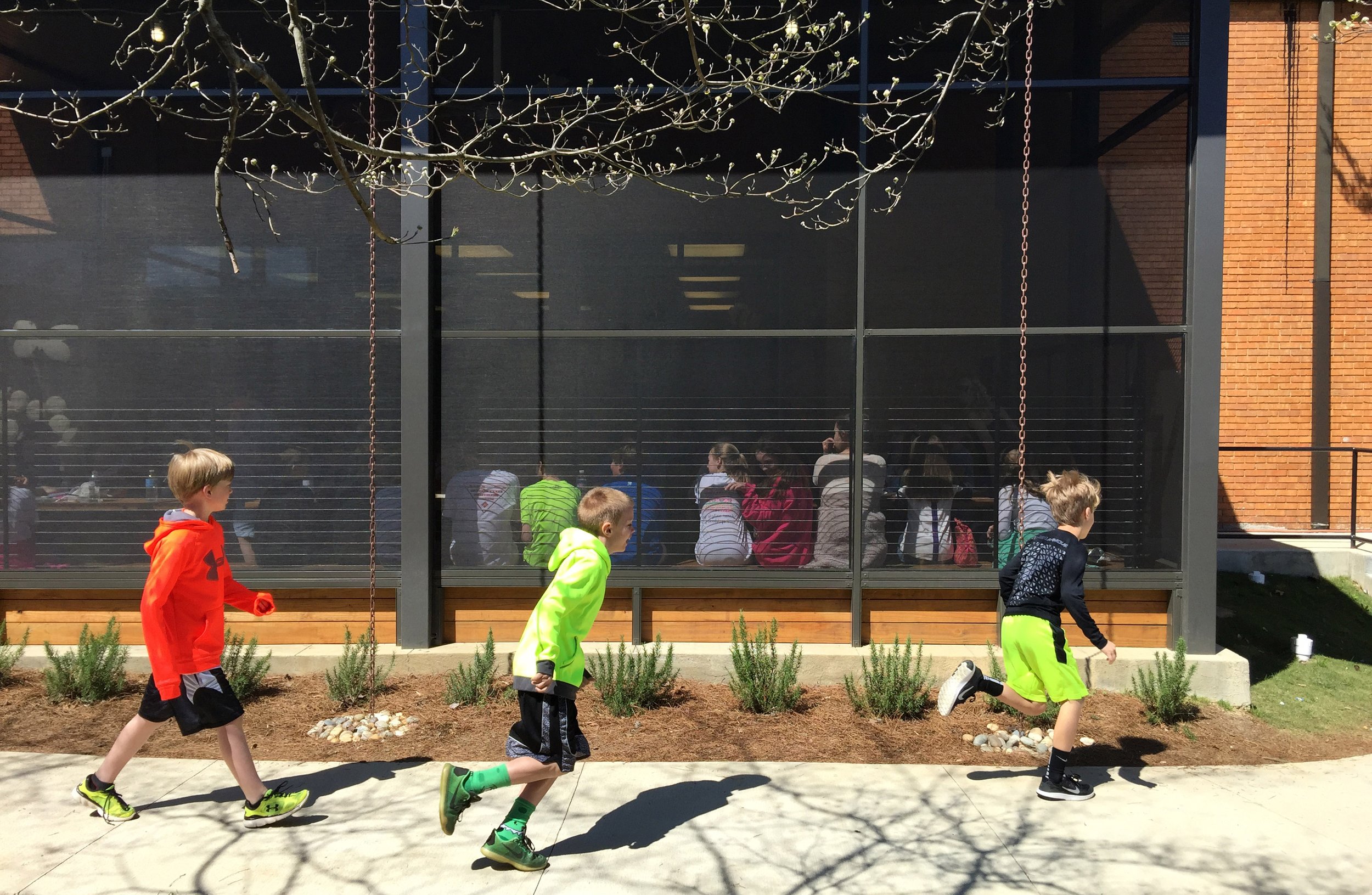 Brookwood Forest  Elementary School screened porch with copper rain chains - project by B Group Architecture, Inc. 