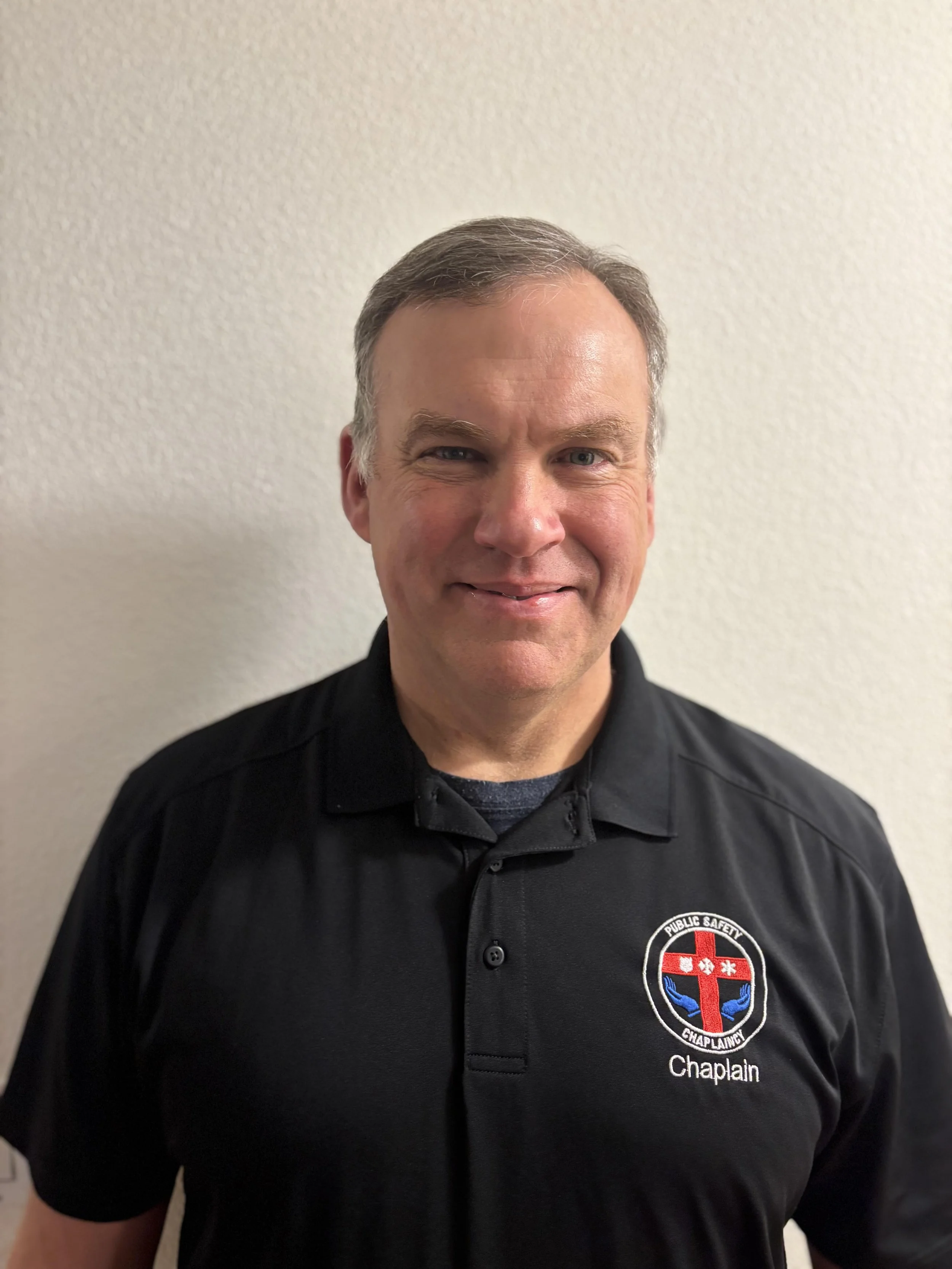 Silhouette of a person's head and shoulders with text 'Photo Coming Soon' overlayed.