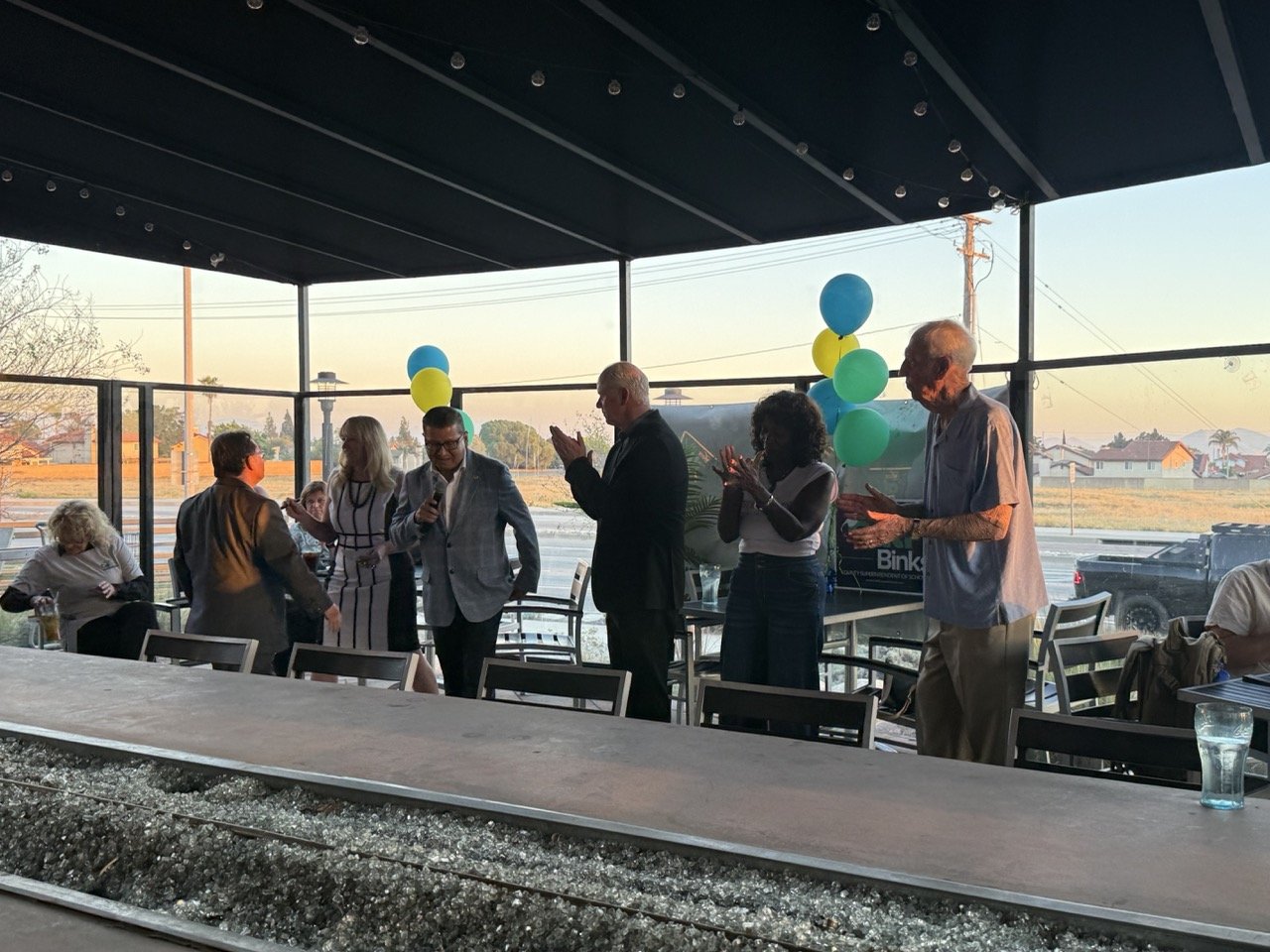 Supervisor Jesse Armendarez speaking to the event guests about why he is endorsing Cali.