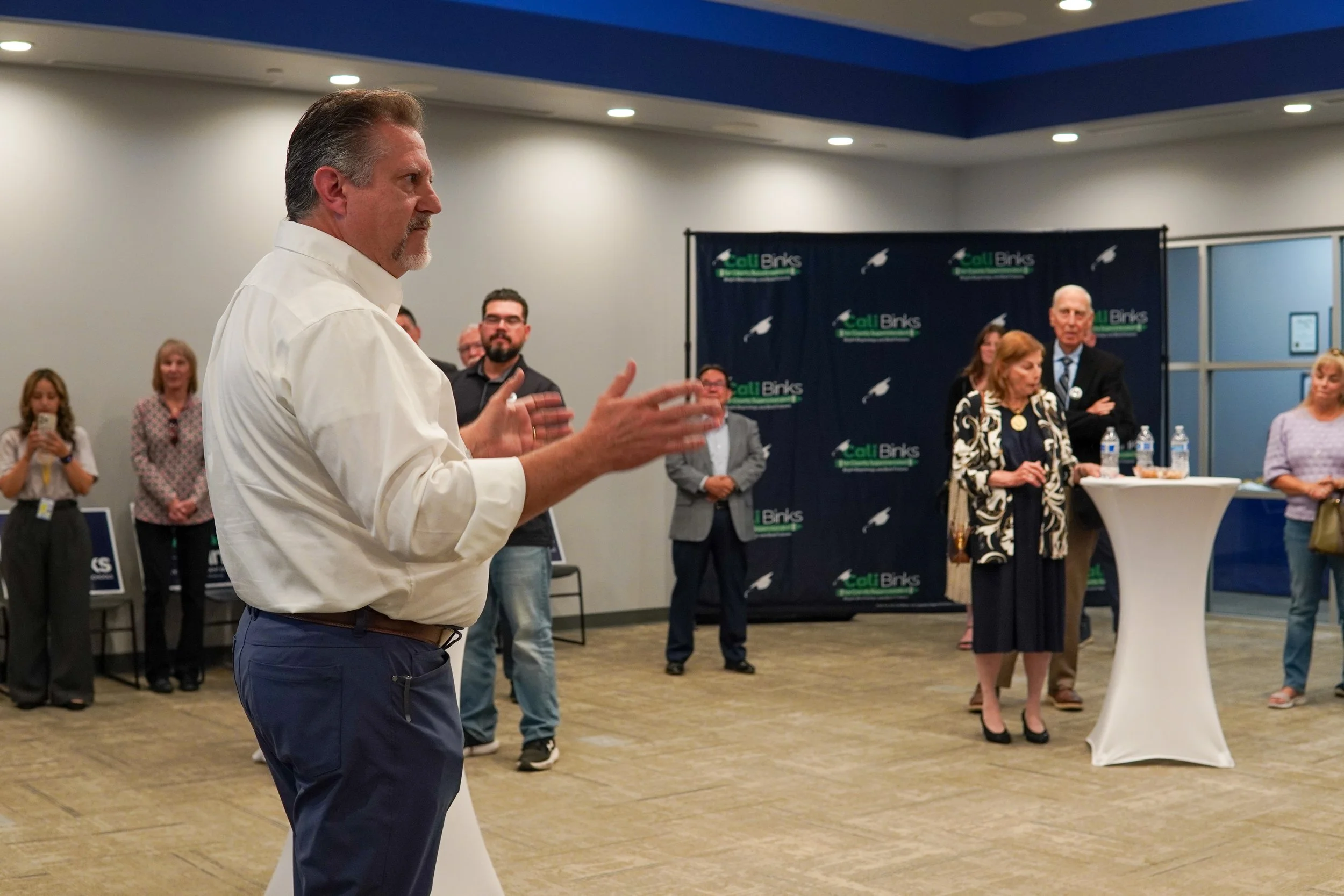Eric speaking to community members at the event.