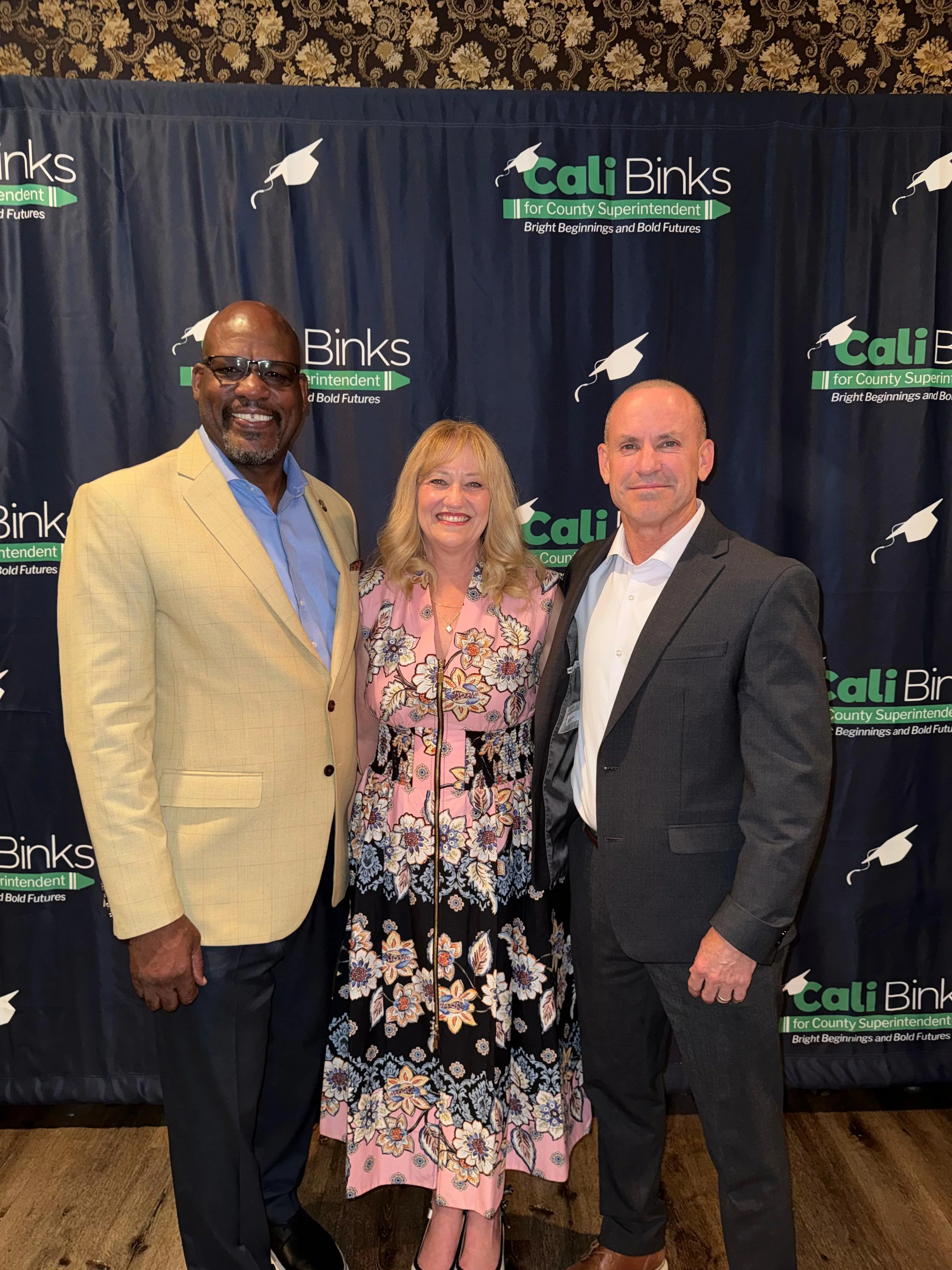 Dr. Don English, Cali Binks, and Dr. Mathew Holton posing for a photo.