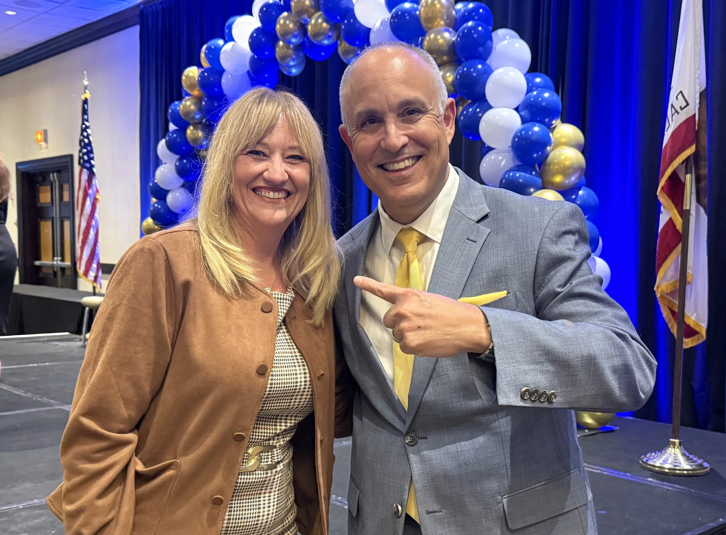 Cali Binks posing with Superintendent Mauricio Arellano, San Bernardino City Unified School District.