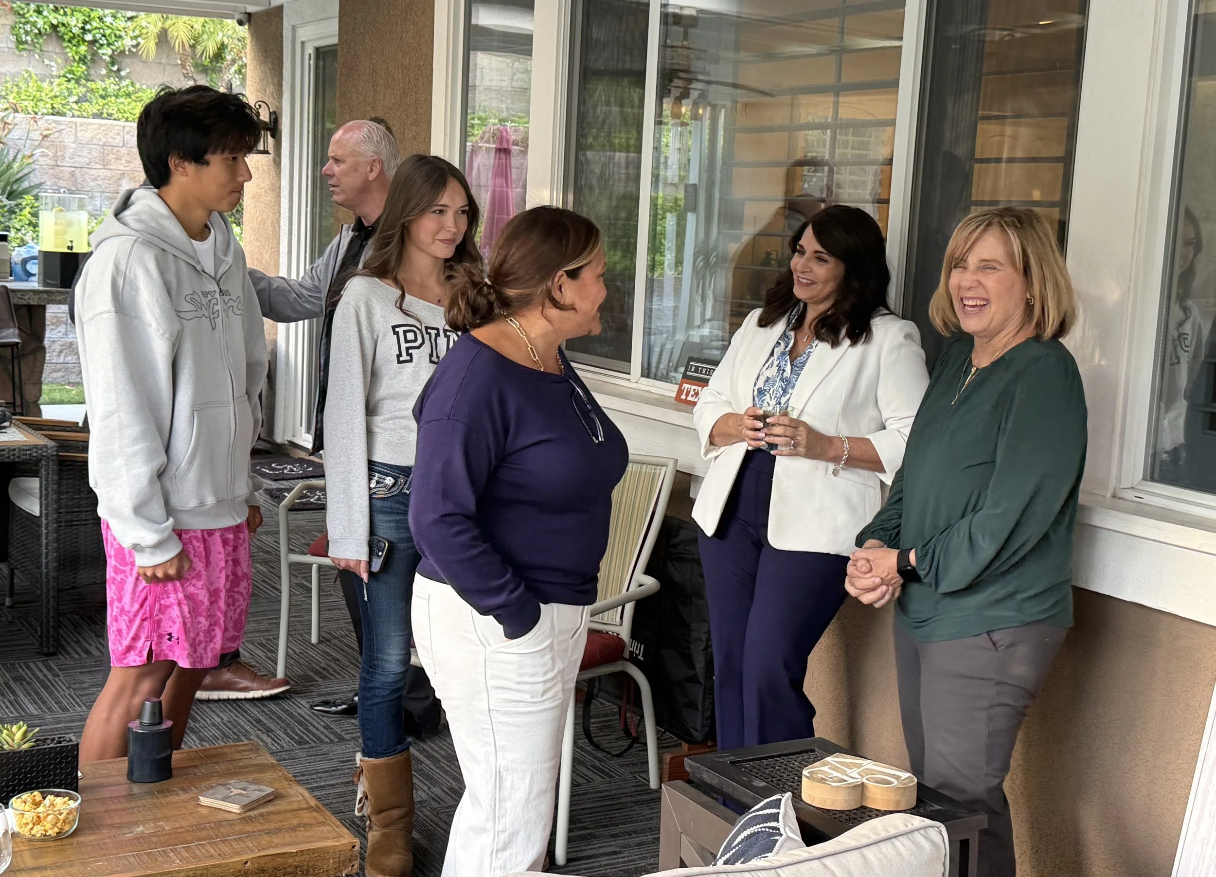 A group of community members networking