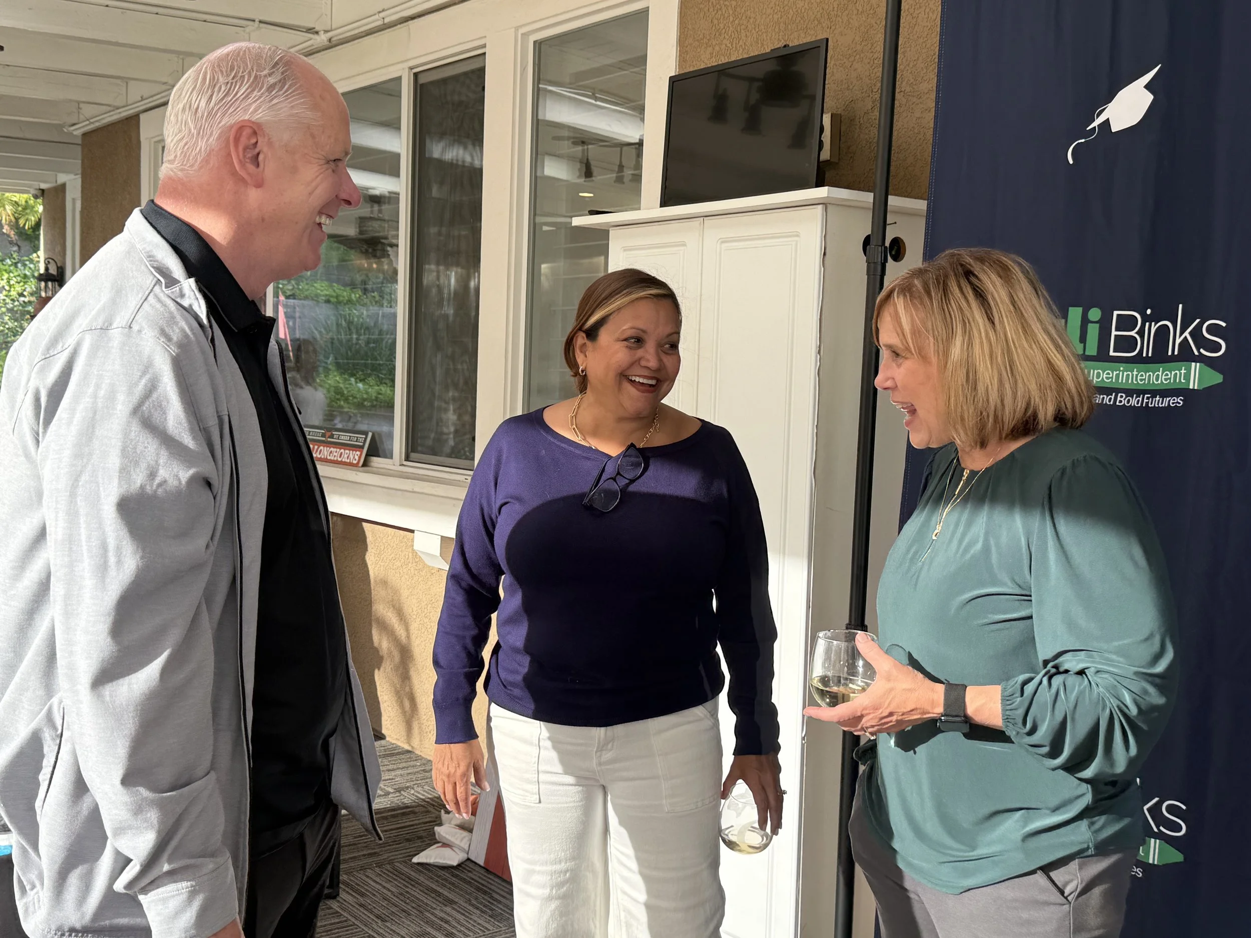 Three adults networking