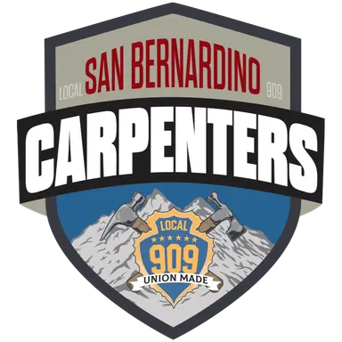 Shield shaped logo with the wording San Bernardino Carpenters and mountain in the inside of the shield with hammer like tools crossed and coming out of another shield with the wording Local 909 Union Made.