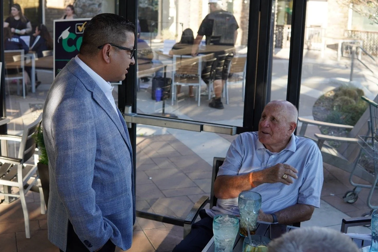 Jesse Armendarez speaking to Larry Clark, former Chief of Police.