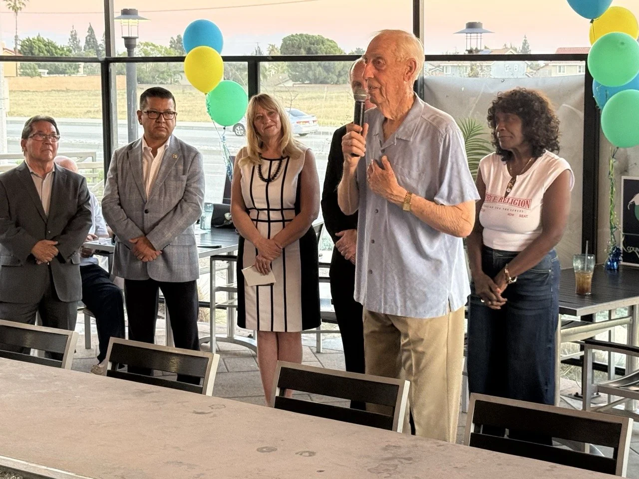 Dr. Herb Fischer speaking to the event guests about why he is endorsing Cali in a different angle.