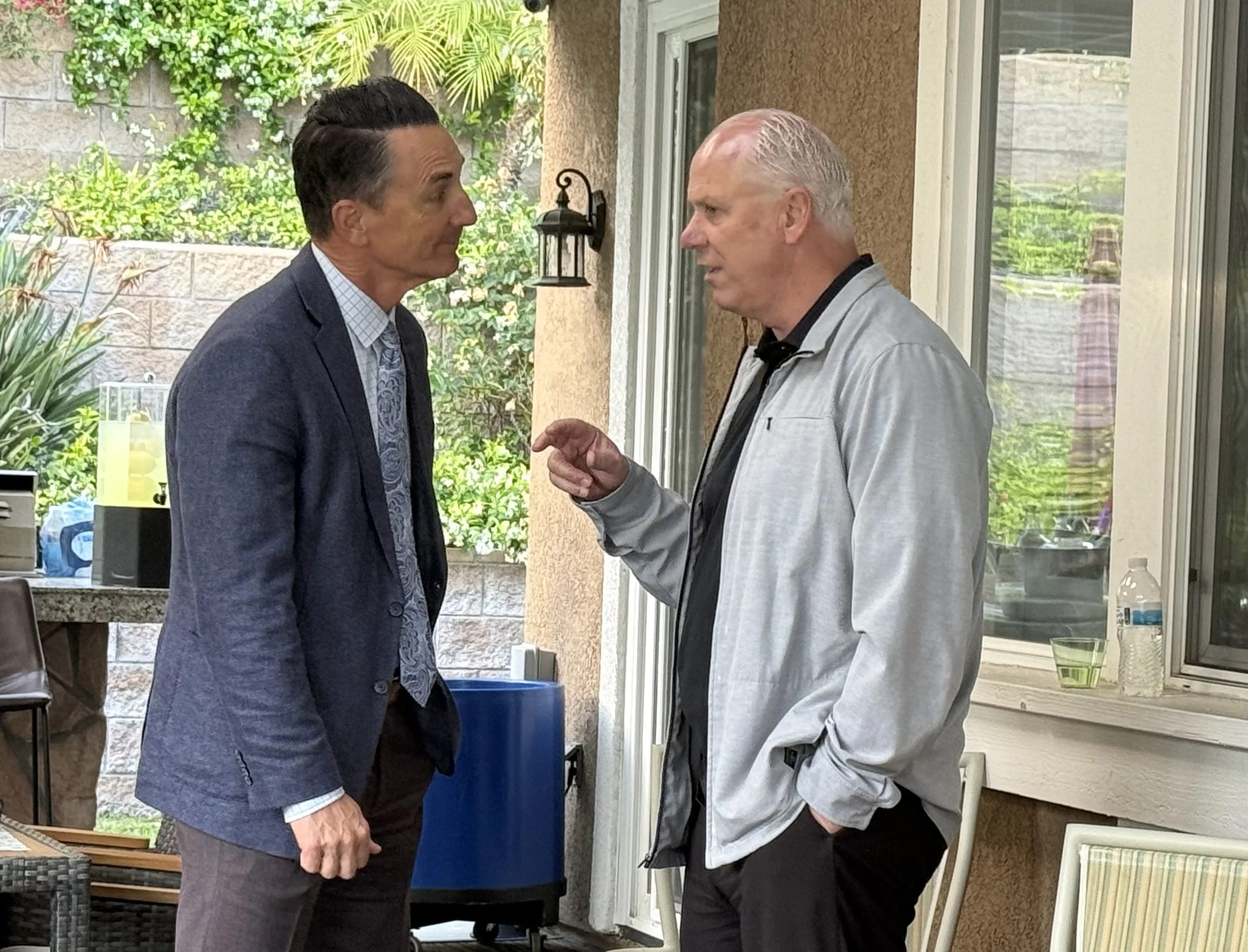 Two community members speaking