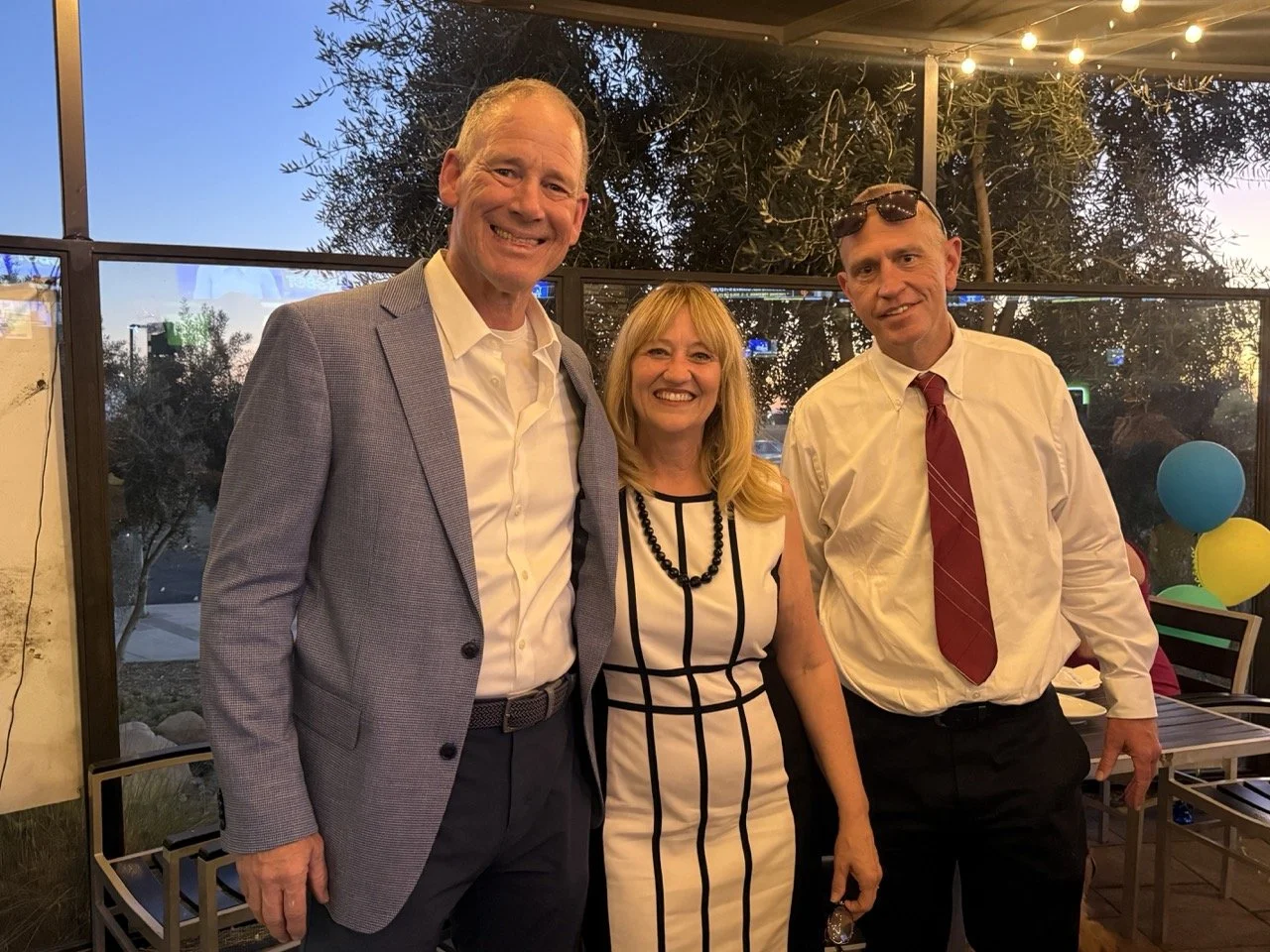Cali posing with Dale Marsden and guest.