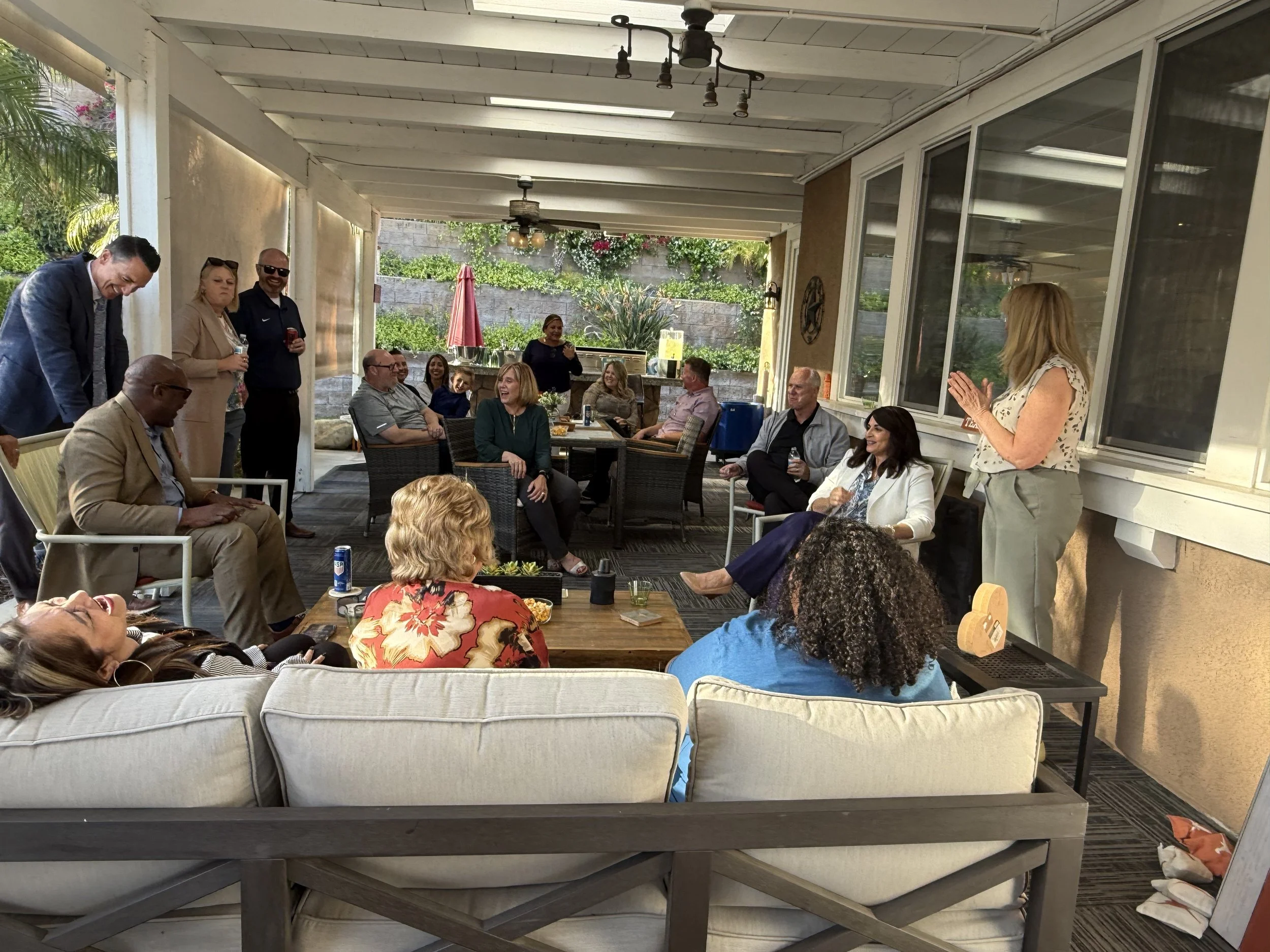 Cali speaking to a crowd of community members