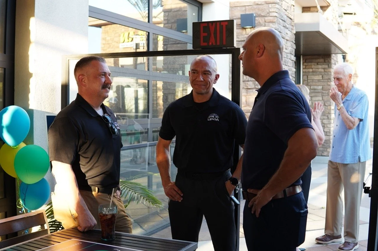 Anthony Vega, Police Chief, City of Colton speaking to two officers from United Probation Officers.