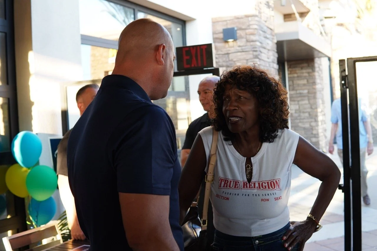 Mayor Acquanetta Warren speaking to Anthony Vega, Police Chief, City of Colton.