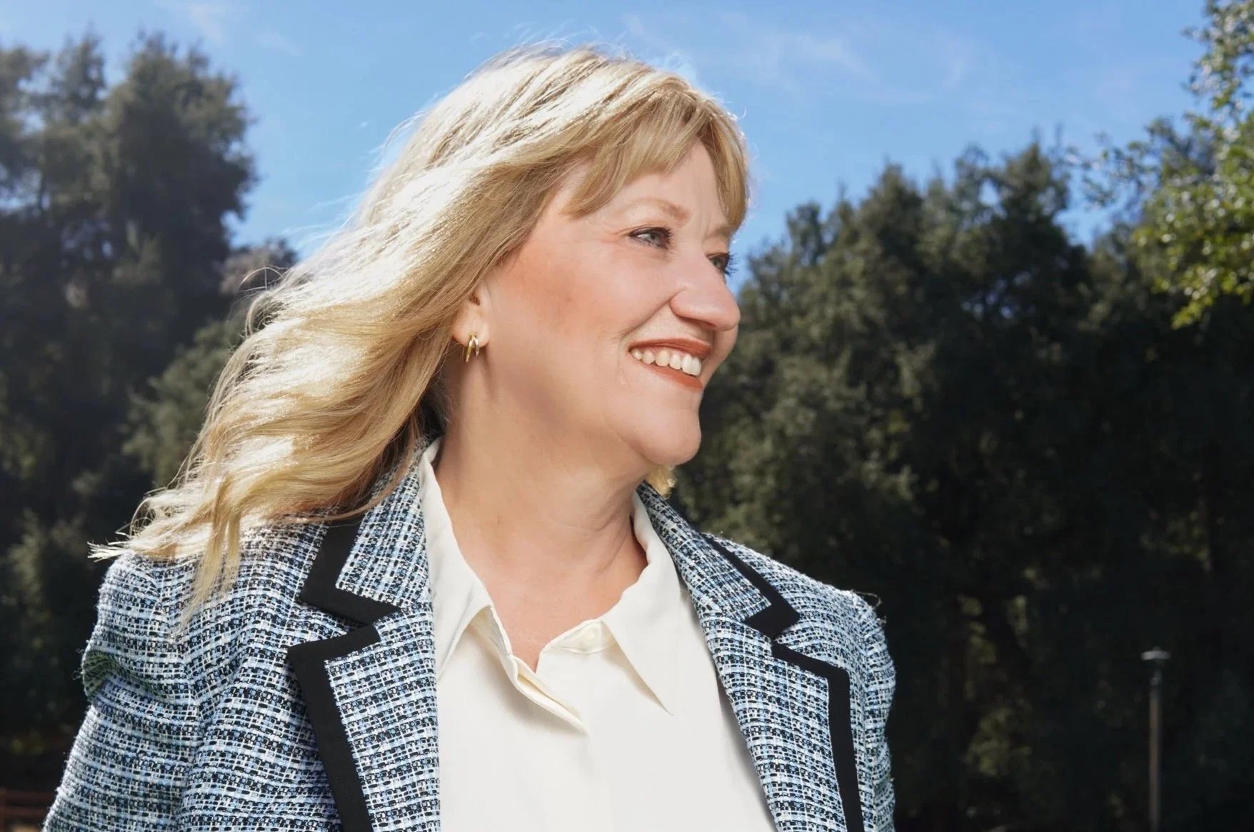 Cali looking towards the right in an outdoor setting.