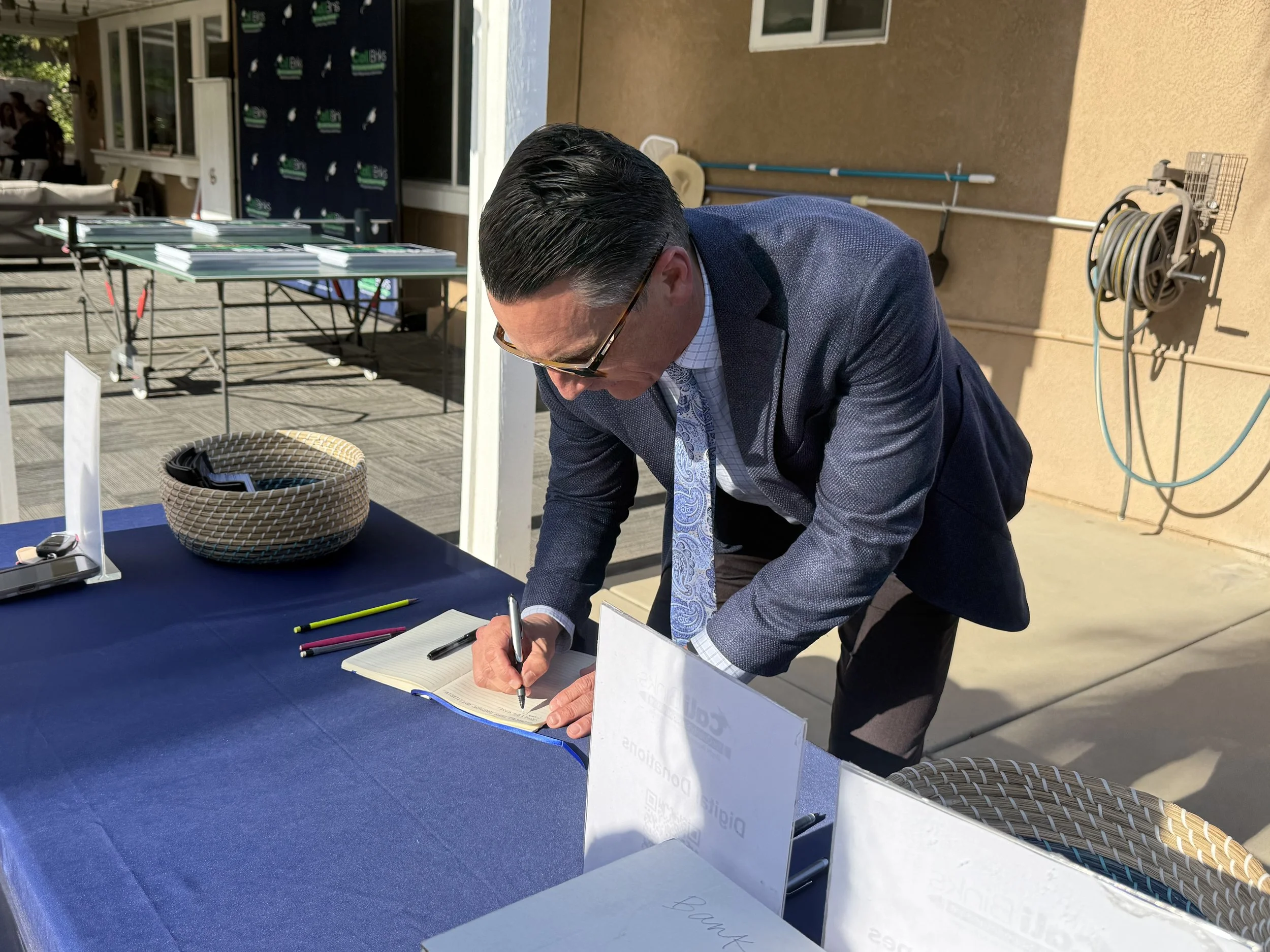 Adult signing in for the event