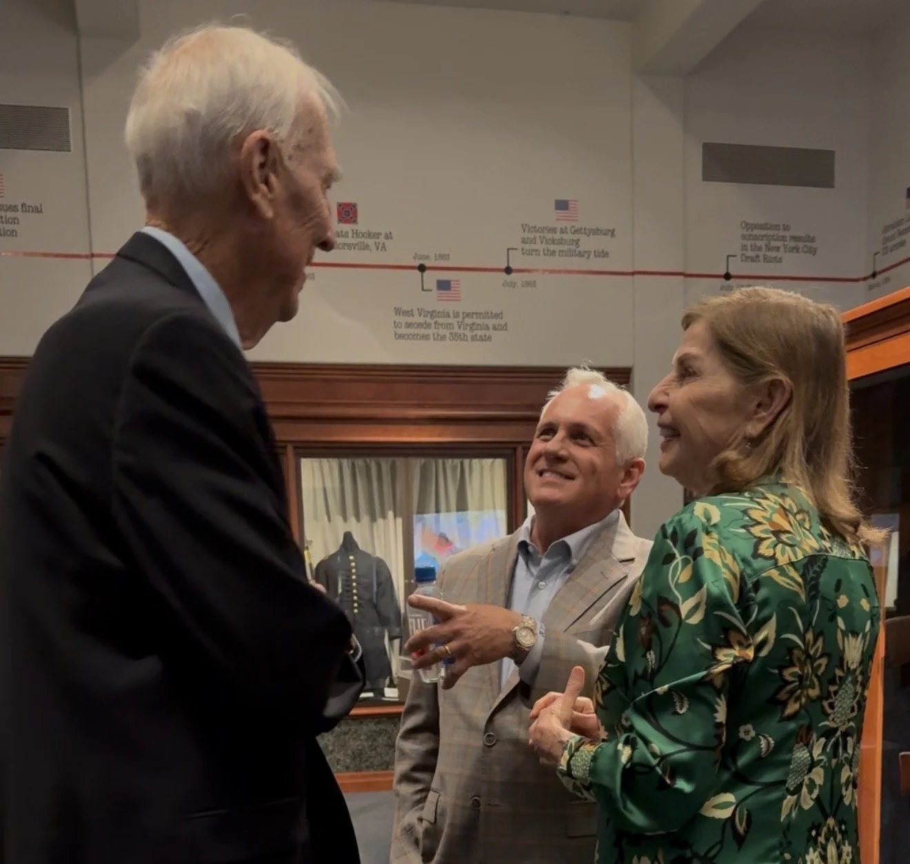 Neal Waner and Dr. Cheryl and Herb Fisher speaking
