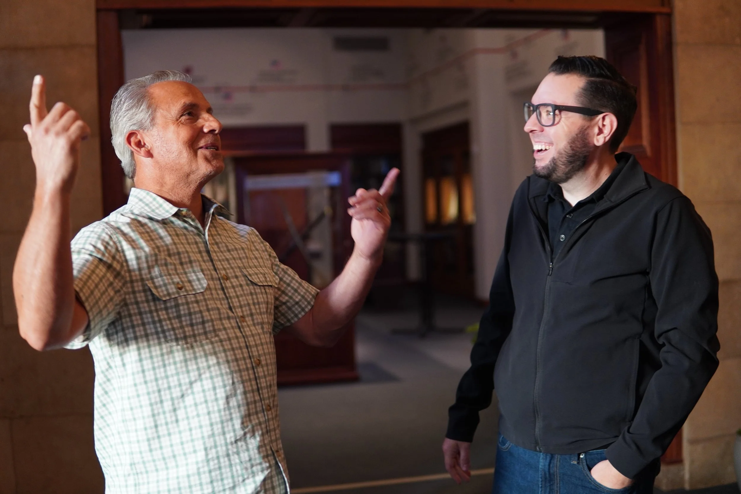 Two community members speaking