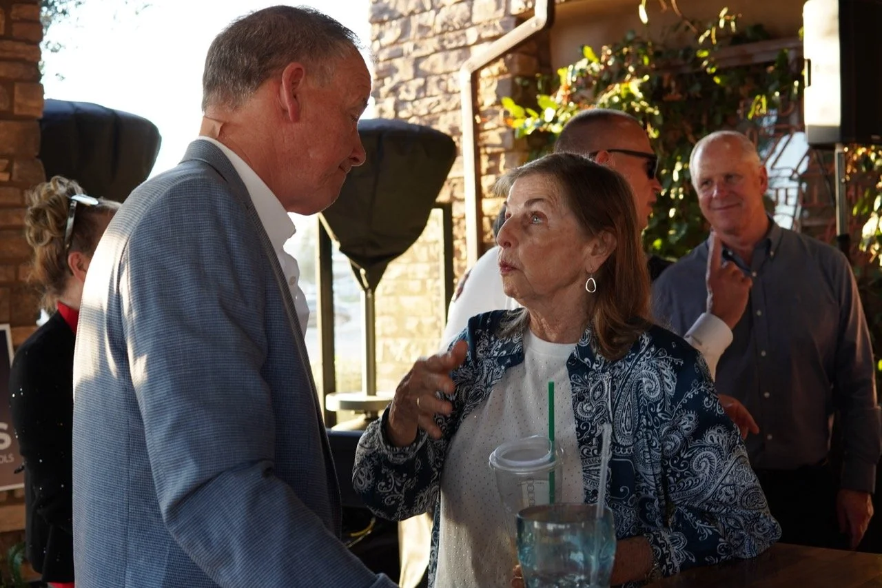 Dr. Cheryl Fischer speaking to Dale Marsden.