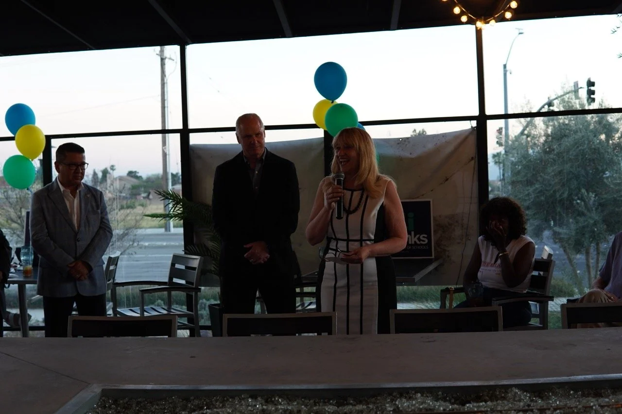 Cali speaking to the event guests about her running for San Bernardino County Superintendent.