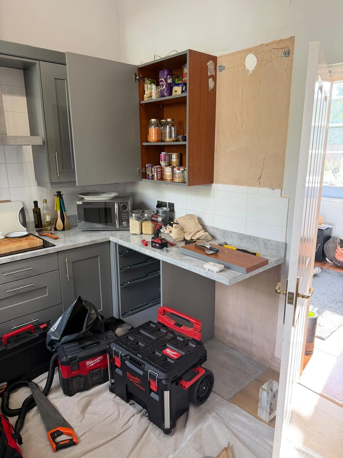 Kitchen units being moved and altered