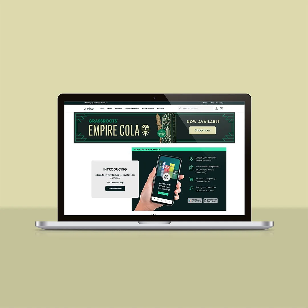Laptop displaying a cannabis e-commerce website featuring the 'Empire Cola' product and a mobile app introduction.