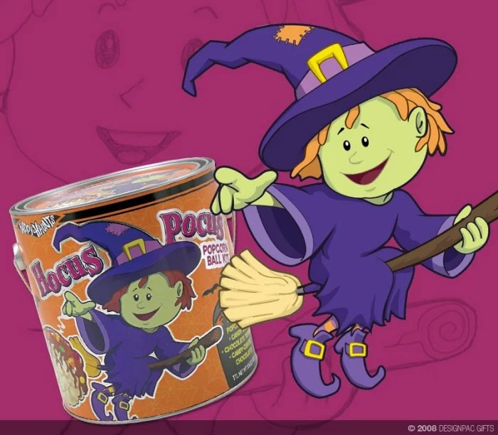 A cartoon illustration of a witch dressed in purple, with a pointy hat and broomstick, standing next to a can of snack pop corn. The witch has green skin, orange hair, and is smiling while gesturing with her hand.