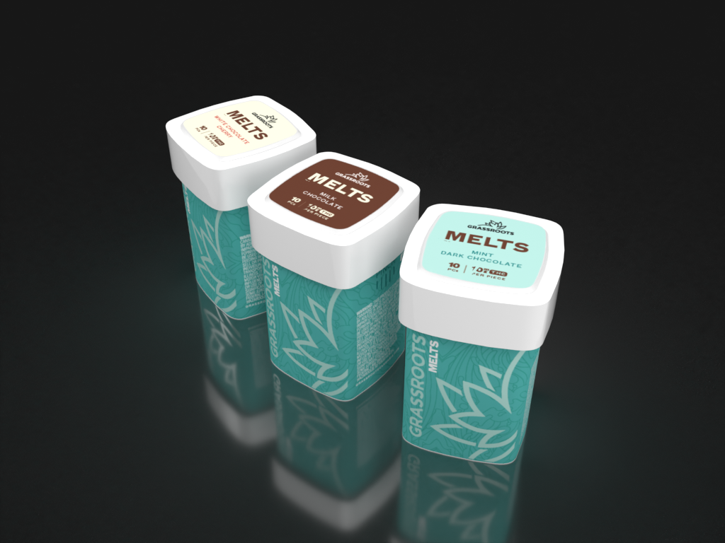 Three Grassroots Melts ice cream bars in mint dark chocolate, milk chocolate, and original flavors on a dark reflective surface.