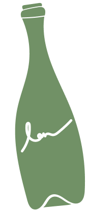 Botella de champán verde con firma en la etiqueta
