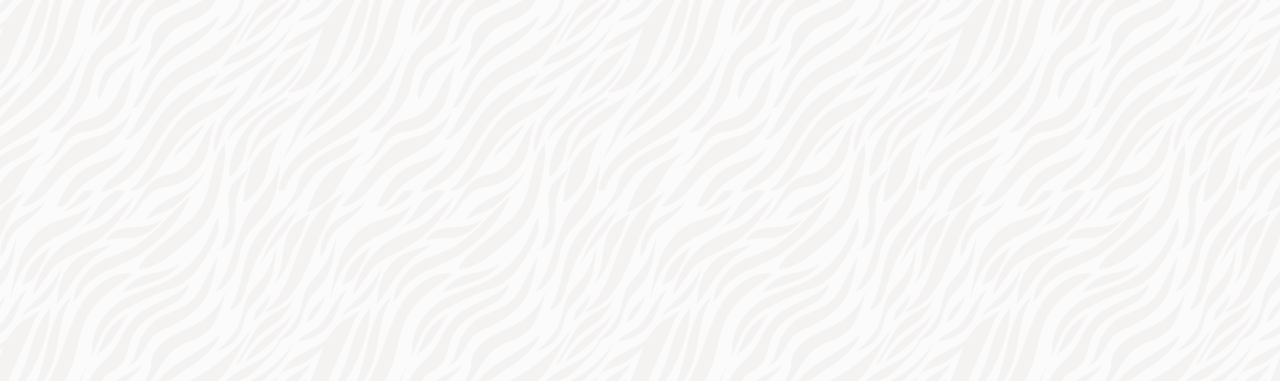 A white, wooden shelf with small books, decorative items, and plants.