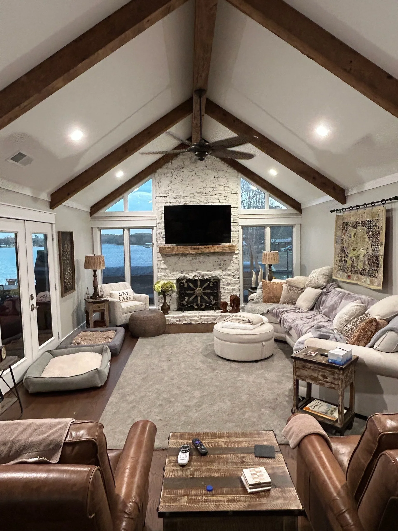 Great room renovation featuring a vaulted ceiling that enhances scale and openness, creating a spacious interior designed for everyday living and gathering.