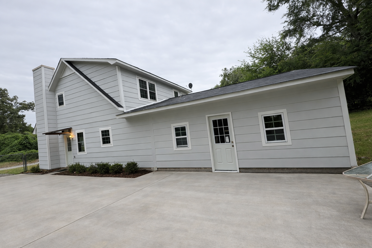 A seamless exterior featuring clean geometry, coordinated siding, and carefully integrated rooflines that enhance both usability and curb appeal. 