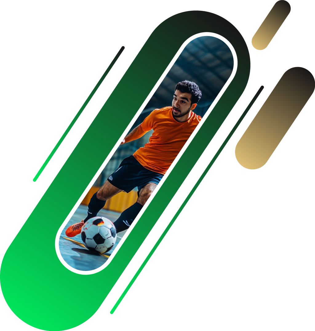 A soccer player in an orange shirt and black shorts playing indoor soccer.