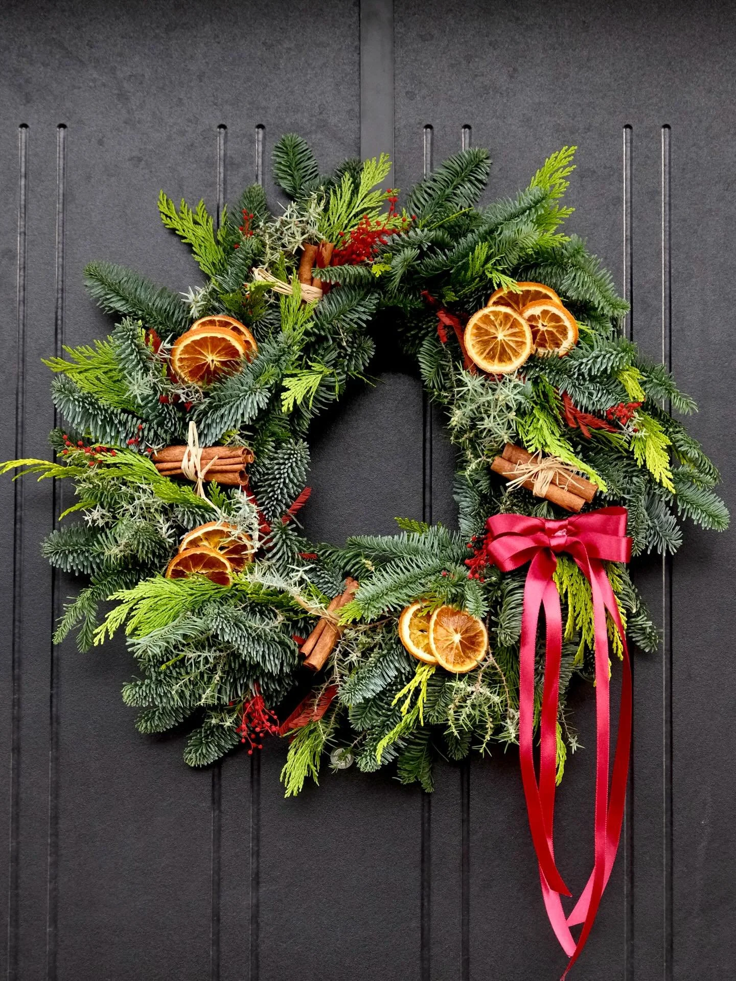 One of the things that makes me happiest in winter is a warm cup of mulled wine and the fresh pine scent of winter foliage. This year&rsquo;s Christmas wreath features vibrant, colourful tones to match the festive spirit of the season.
#christmas #ch
