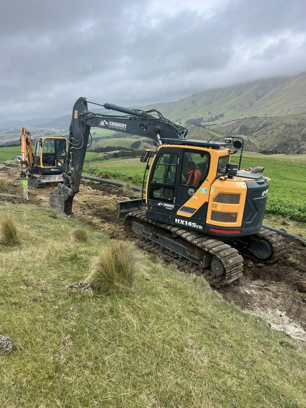 digger, underground, diggers, new zealand, chinnery construction, limited, ltd, dirt, preparation, pipeline