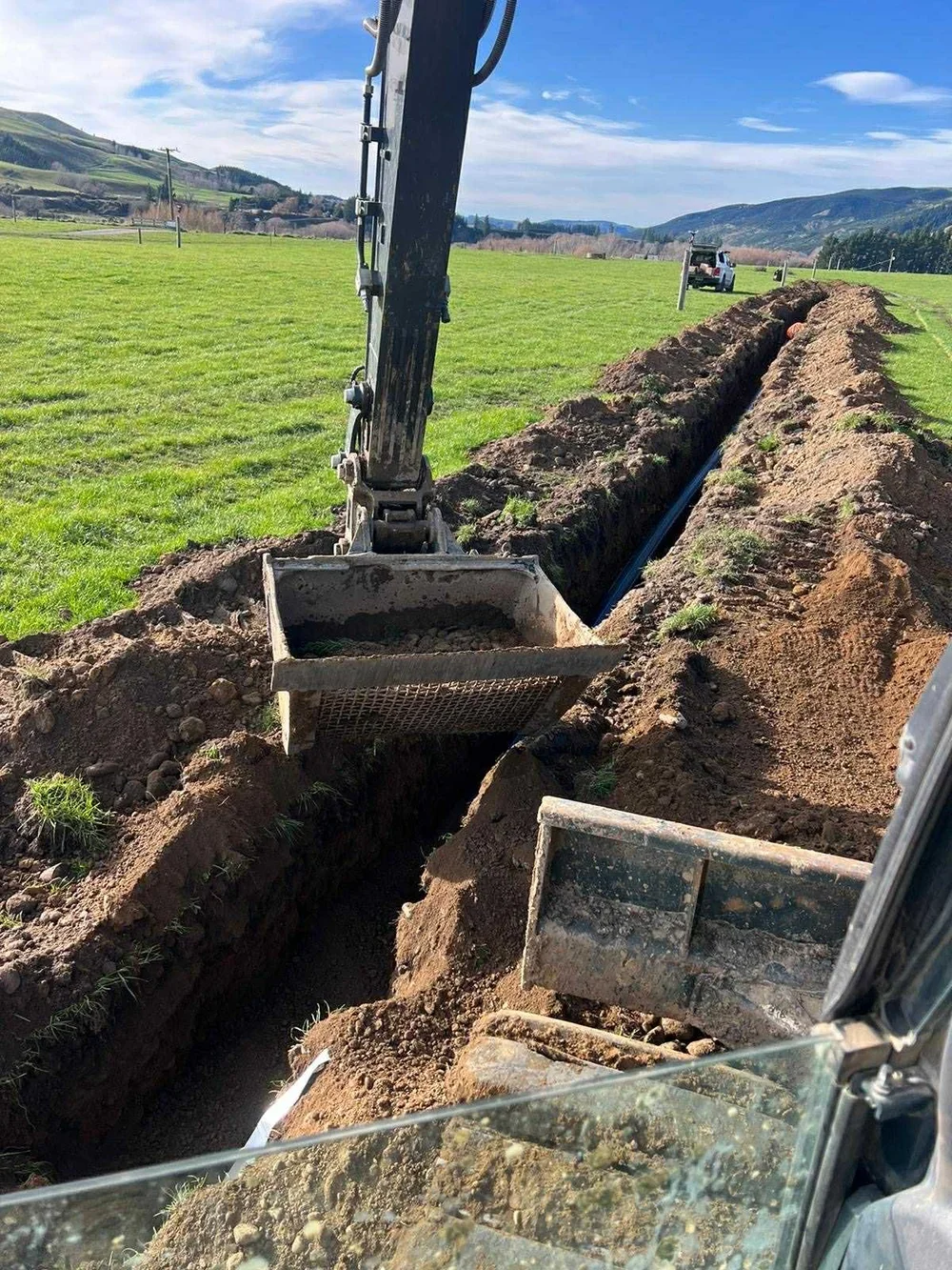 bucket, dirt, dug, digger cab, yellow digger, grass, new zealand 