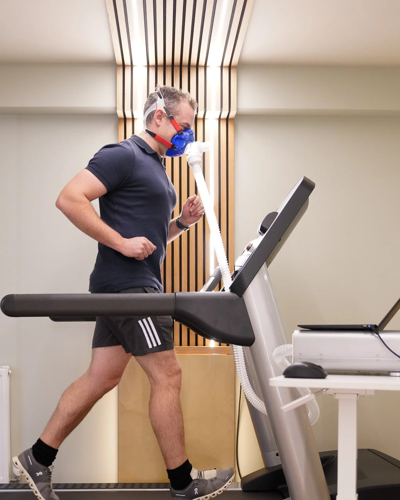 A male carrying out a VO2 threshold test as part of a NuMi 360º health check.