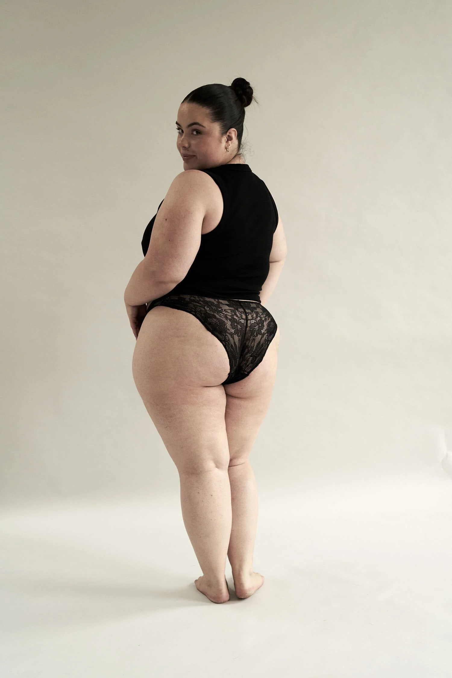 Woman wearing Belle Rebellion period lingerie feeling confident and secure.