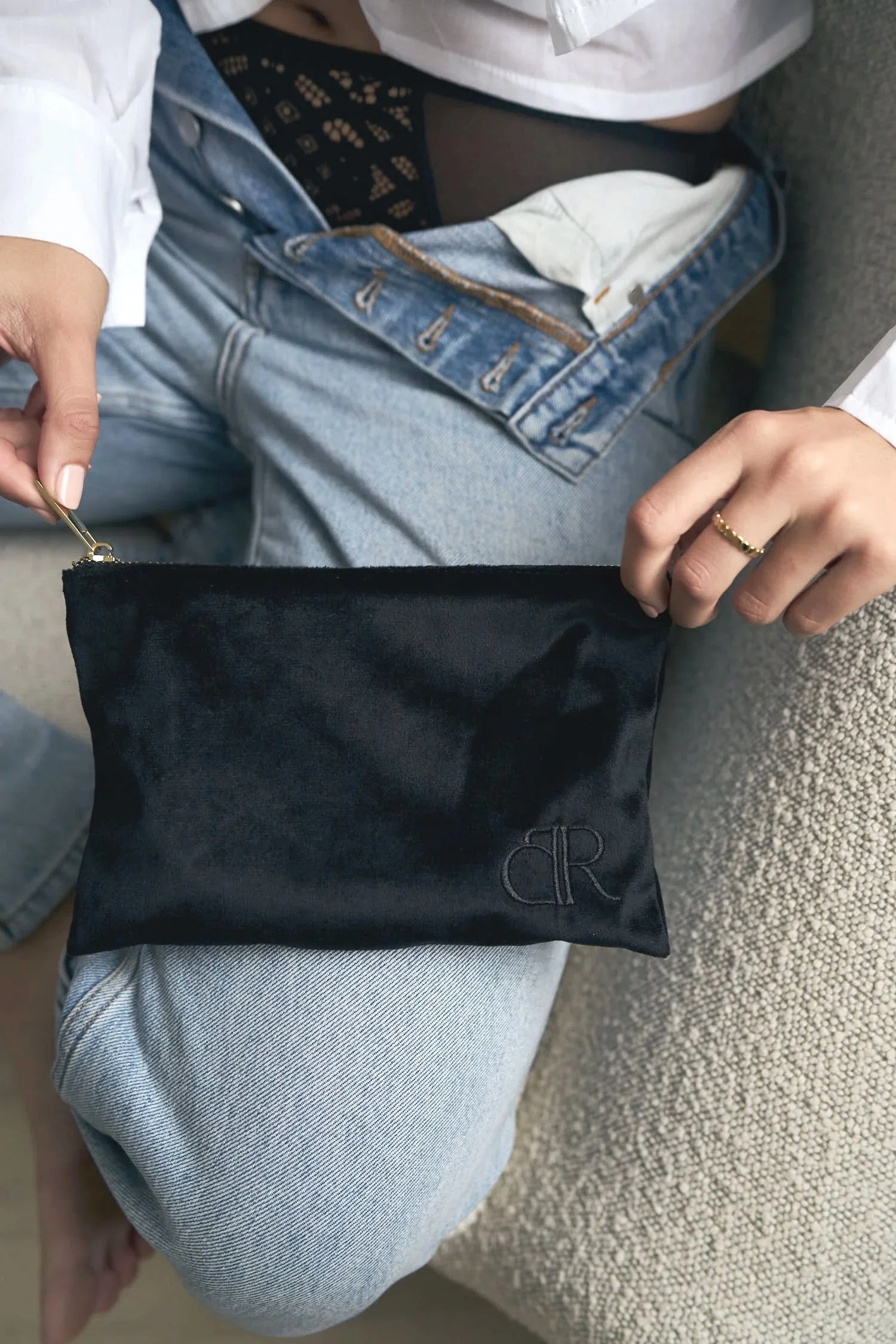 “Elegant Belle Rebellion pouch for carrying period underwear during travel or daily wear.