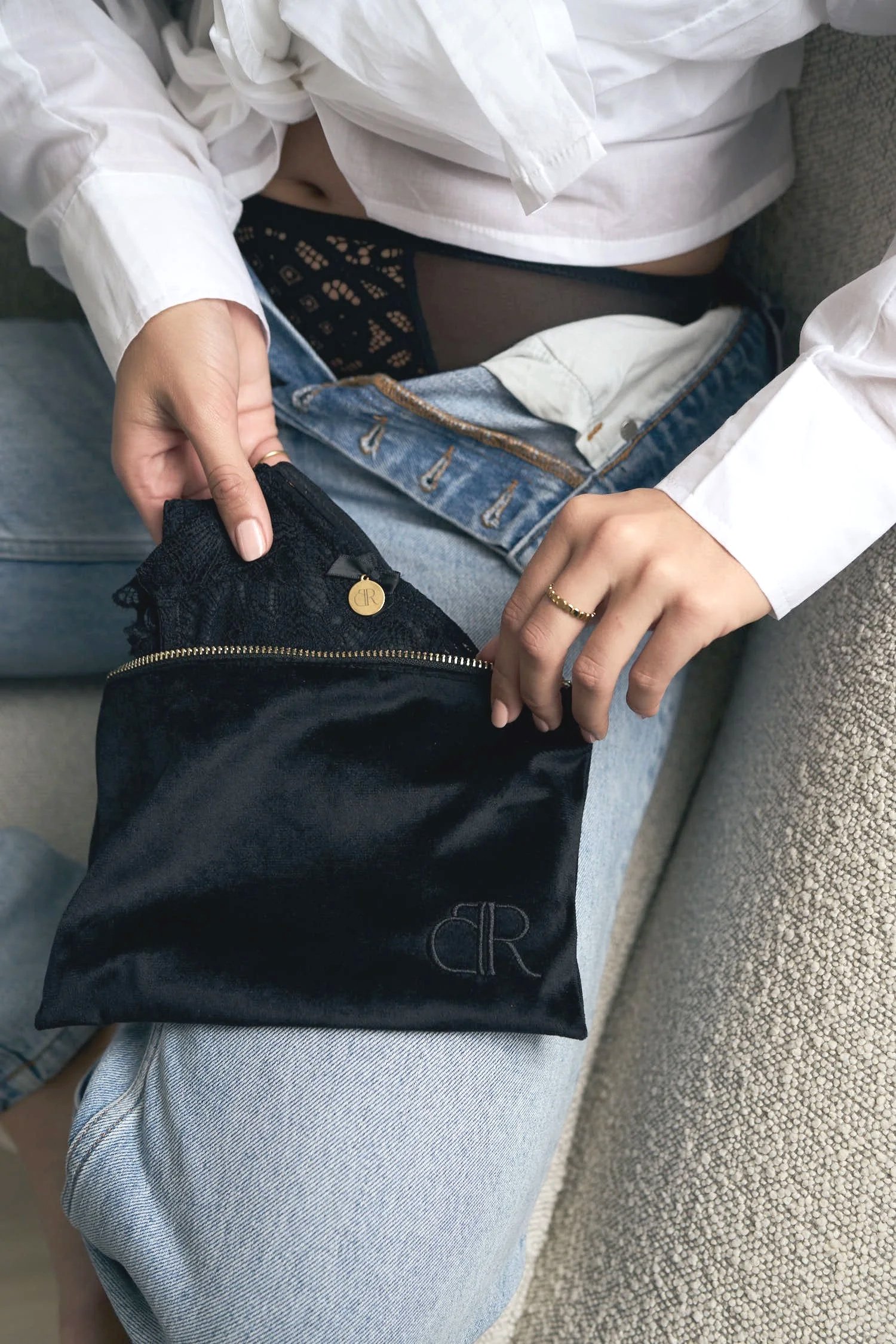 Luxury period pouch used for travel, work, and everyday menstrual care.