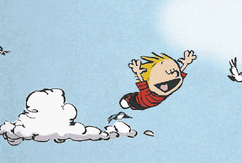Calvin from Calvin and Hobbes flying through the sky with arms outstretched, smiling, as a cloud trail follows behind him.
