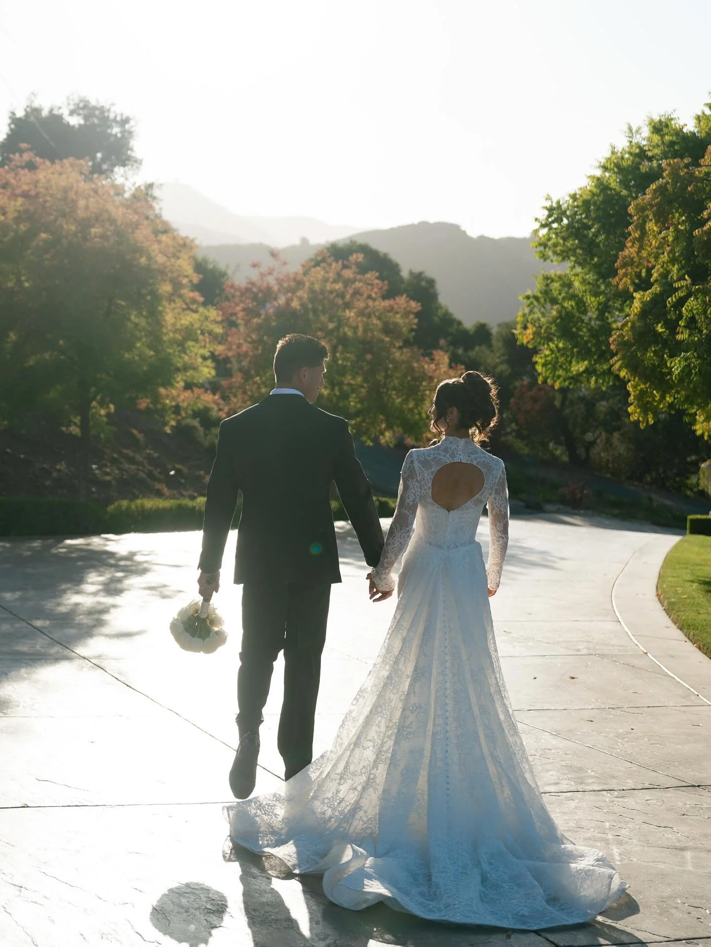 Mr. &amp; Mrs. Ryan🤍🕊️

Wedding Planner: @the.event.gal 
Photographer: @kristinhealyphotography 
Videographer: @houseofjacobfilms 
Florist: @nona_tai_floral_design_studio 
Cake: @icingonthecakebakerylg 
Rentals: @dannythomaspartyrentals 
HMU: @hair