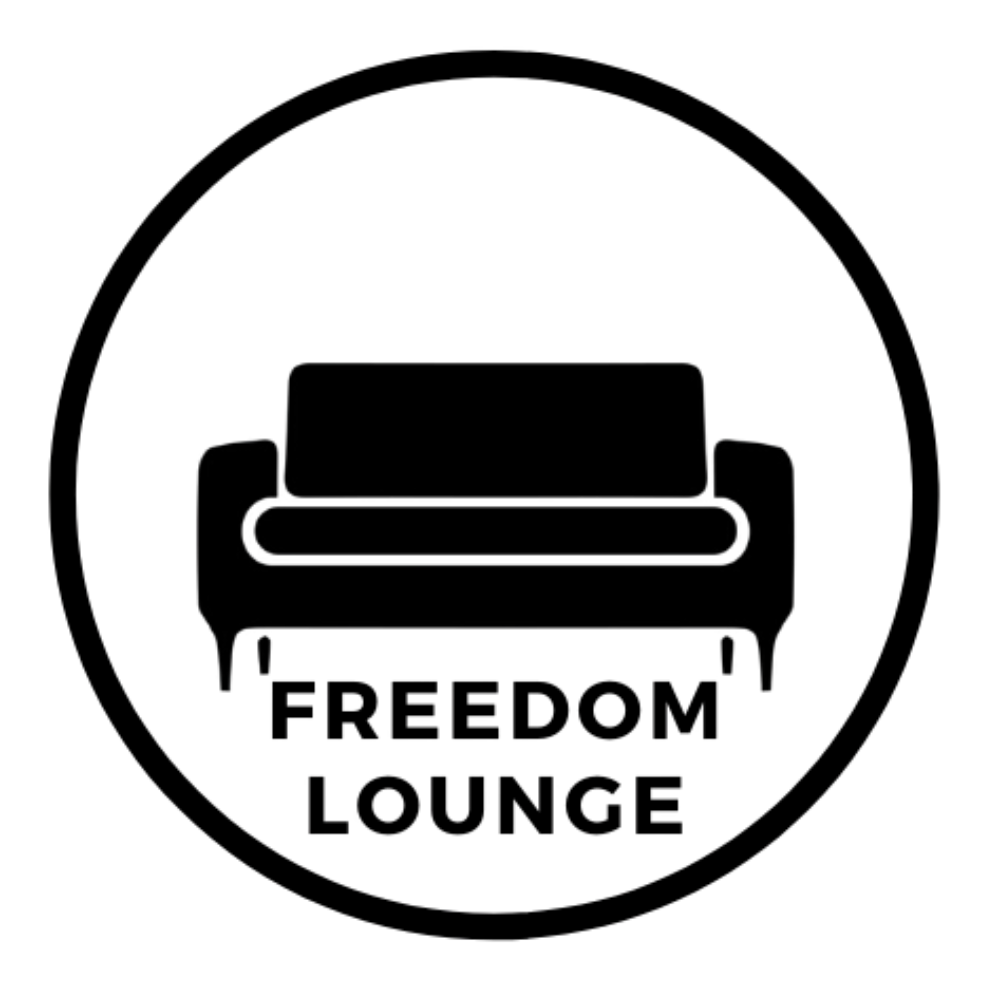 Silhouette of a vintage stereo speaker set against a dark background with a red and white light