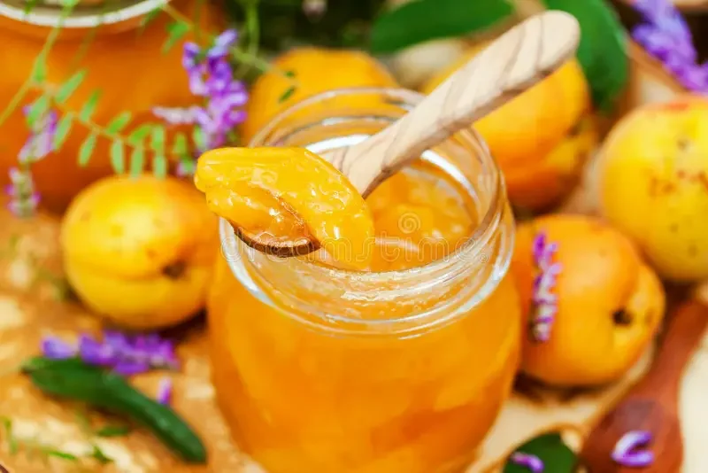 delicious-homemade-apricot-jam-jar-76159373.webp