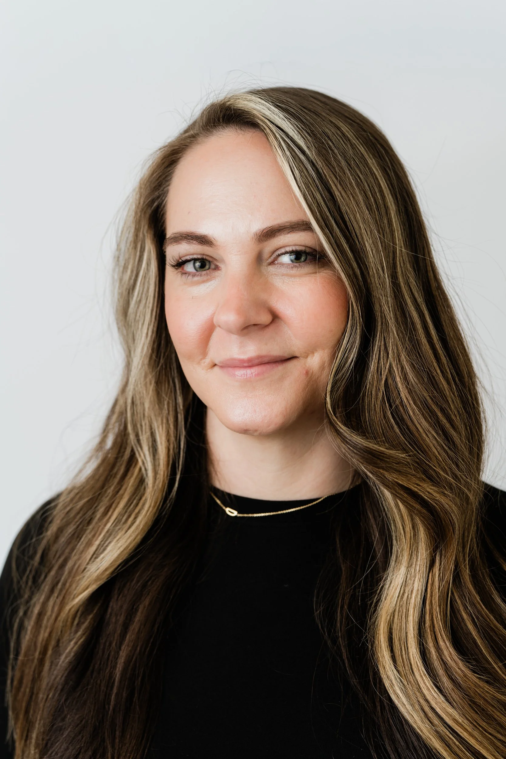 Tracy Roberts, founder of Elevate Headspa in Charlottesville, providing intentional scalp care and headspa experiences.